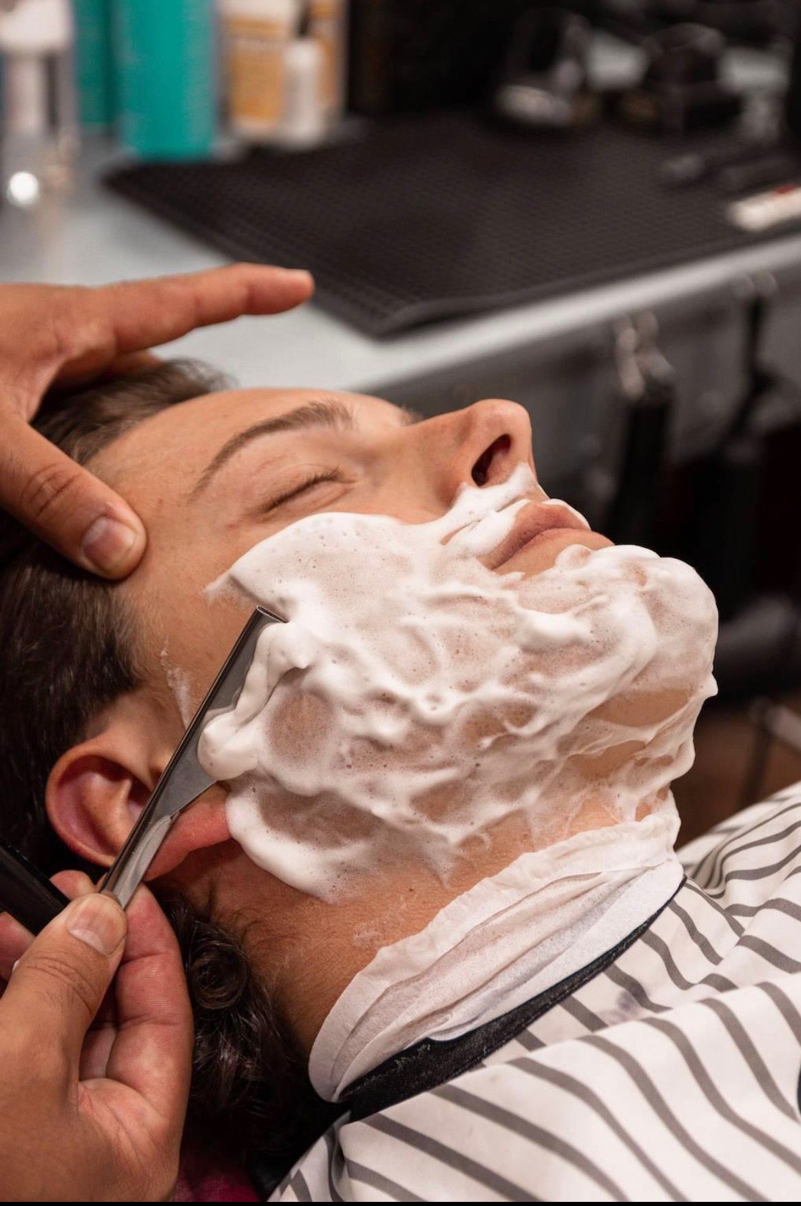 Hot towel shave at Hooley Barbers